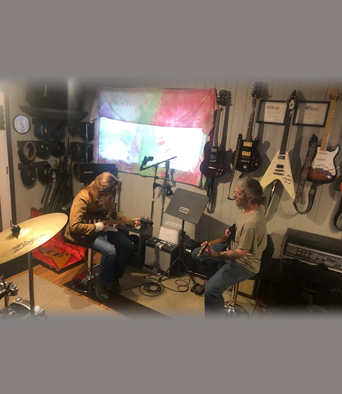 online guitar lessons; Stephen Carrington delivering an in-person lesson